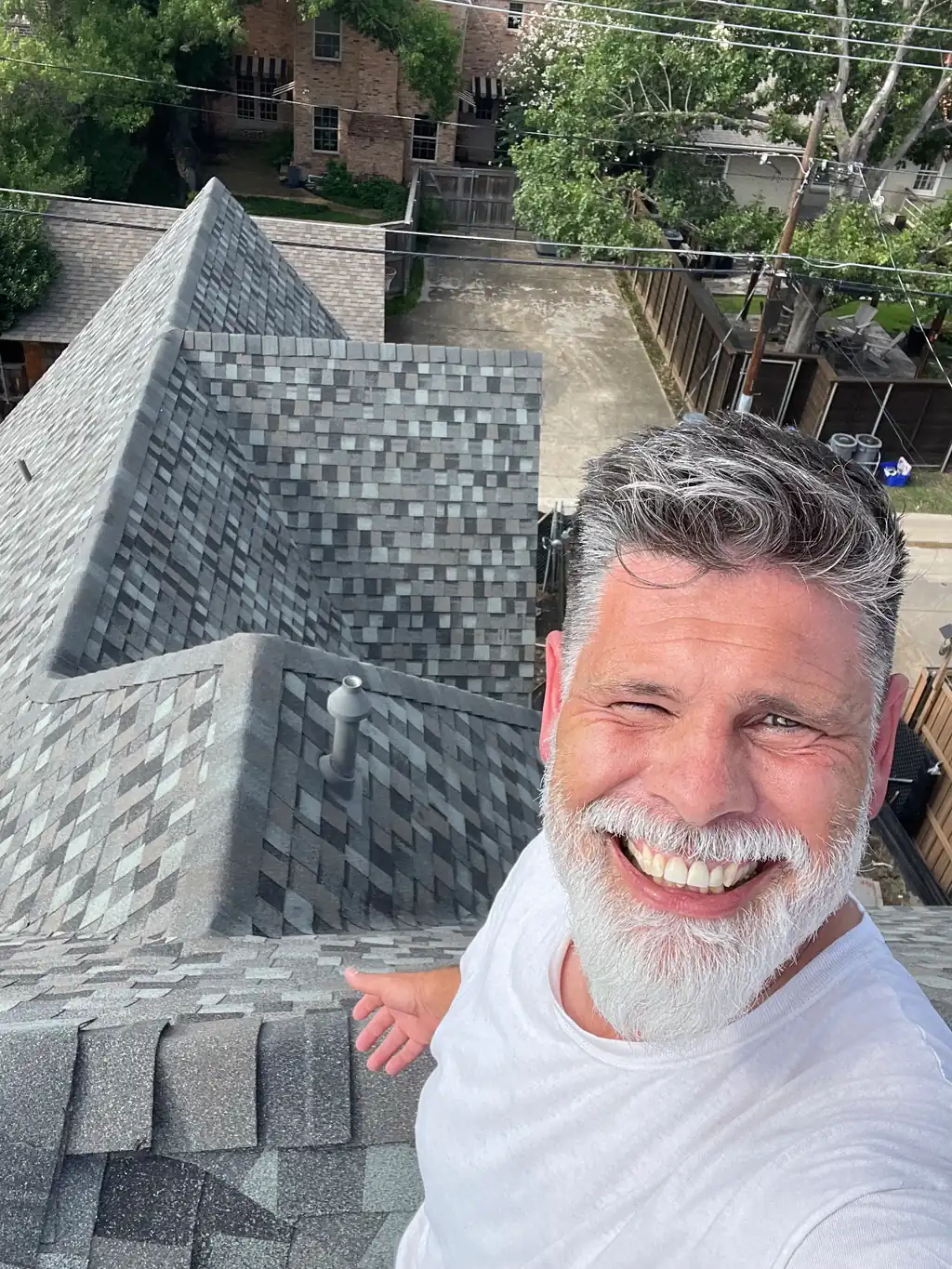 A Texas Accent roofer on a new shingle roof