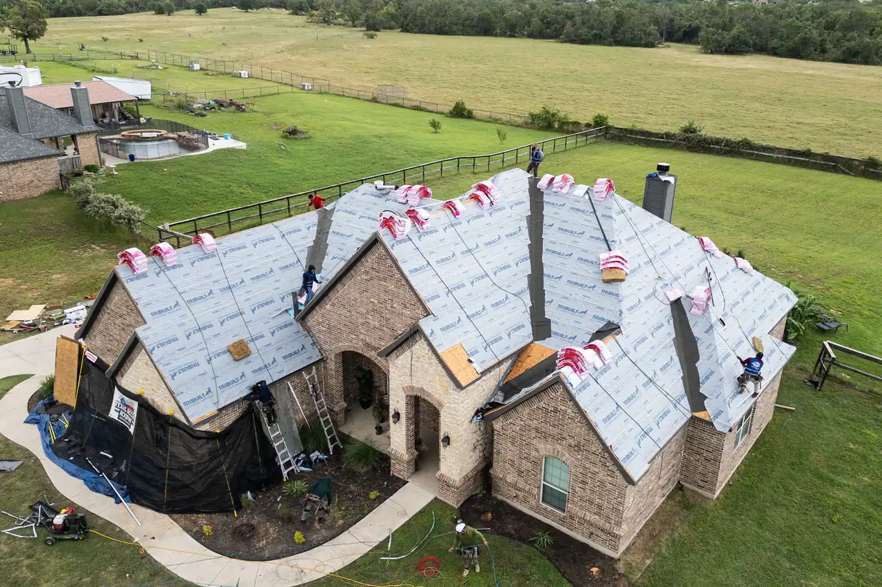 A roof stripped to the deck and covered in synthetic underlayment before the shingles go on