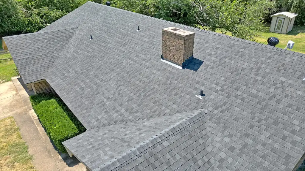 A finished shingle roof and ridge in Hudson Oaks, Parker County, TX